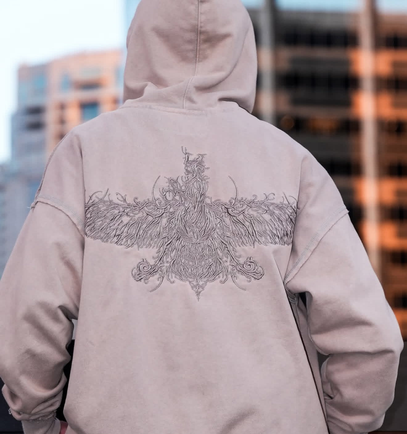 Custom Farvahar embroidery detail on back of luxury Persepolis hoodie