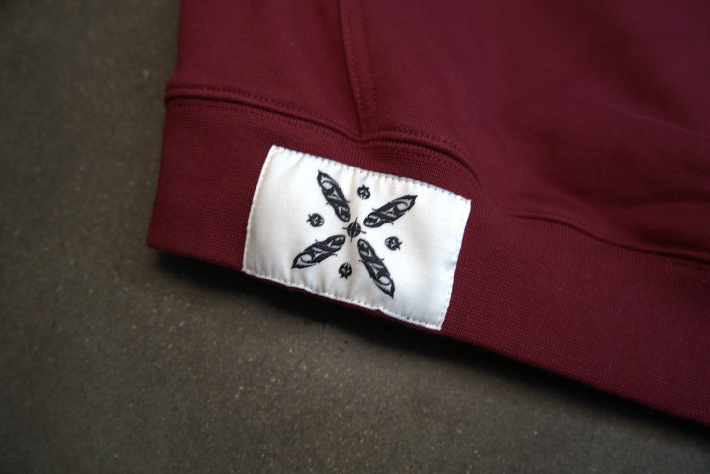 Luxury standard of kaveh tag on the bottom of the cyrus the great hoodie by Xodafez