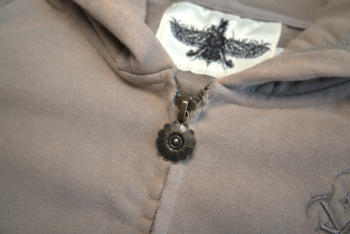 Custom Niloofar zipper detail on luxury Persian hoodie