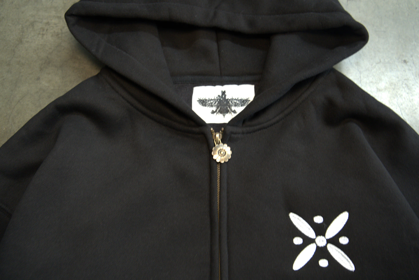 Custom Niloofar zipper detail on Persian streetwear hoodie