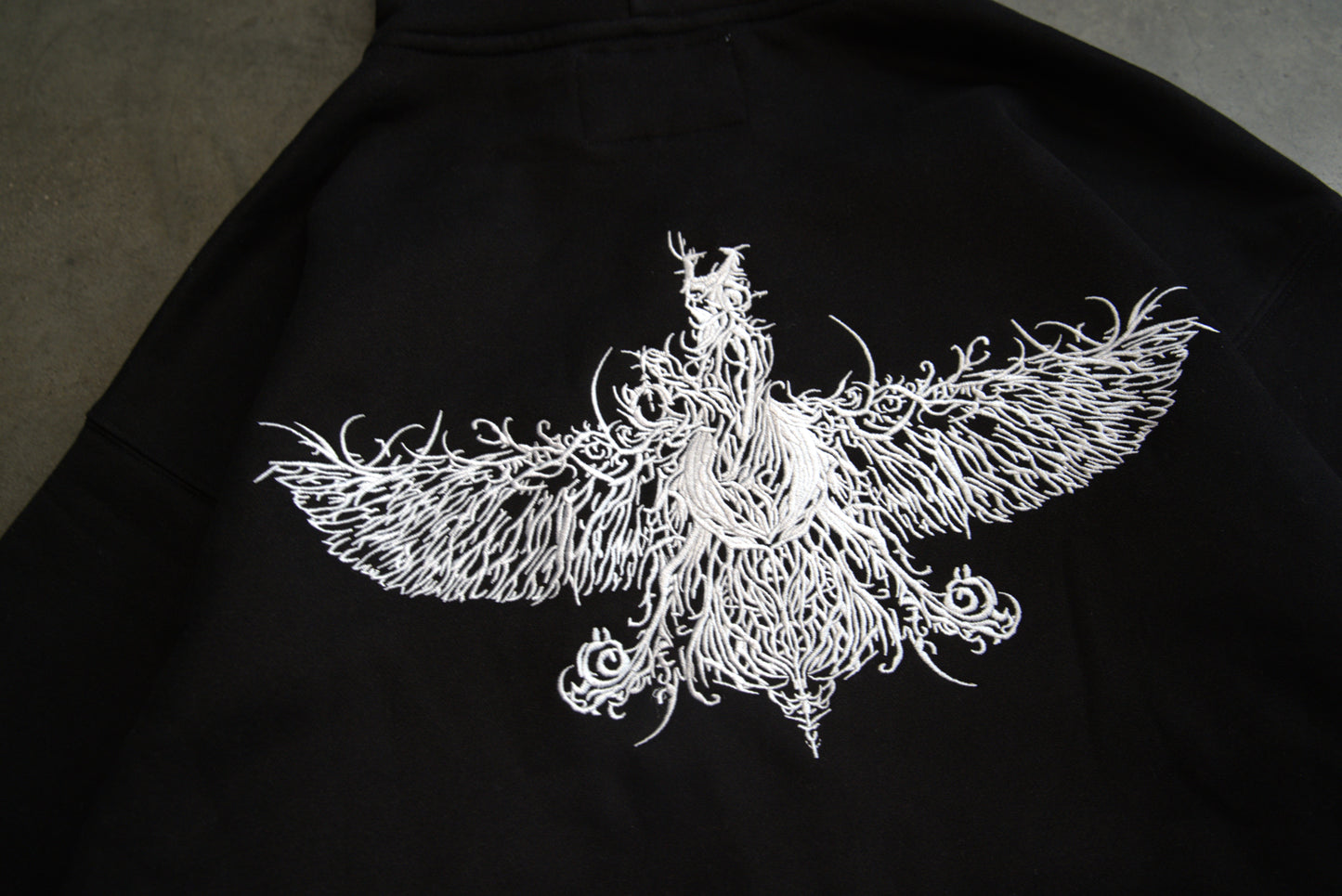 Custom farvahar stiching detail on Persian streetwear hoodie