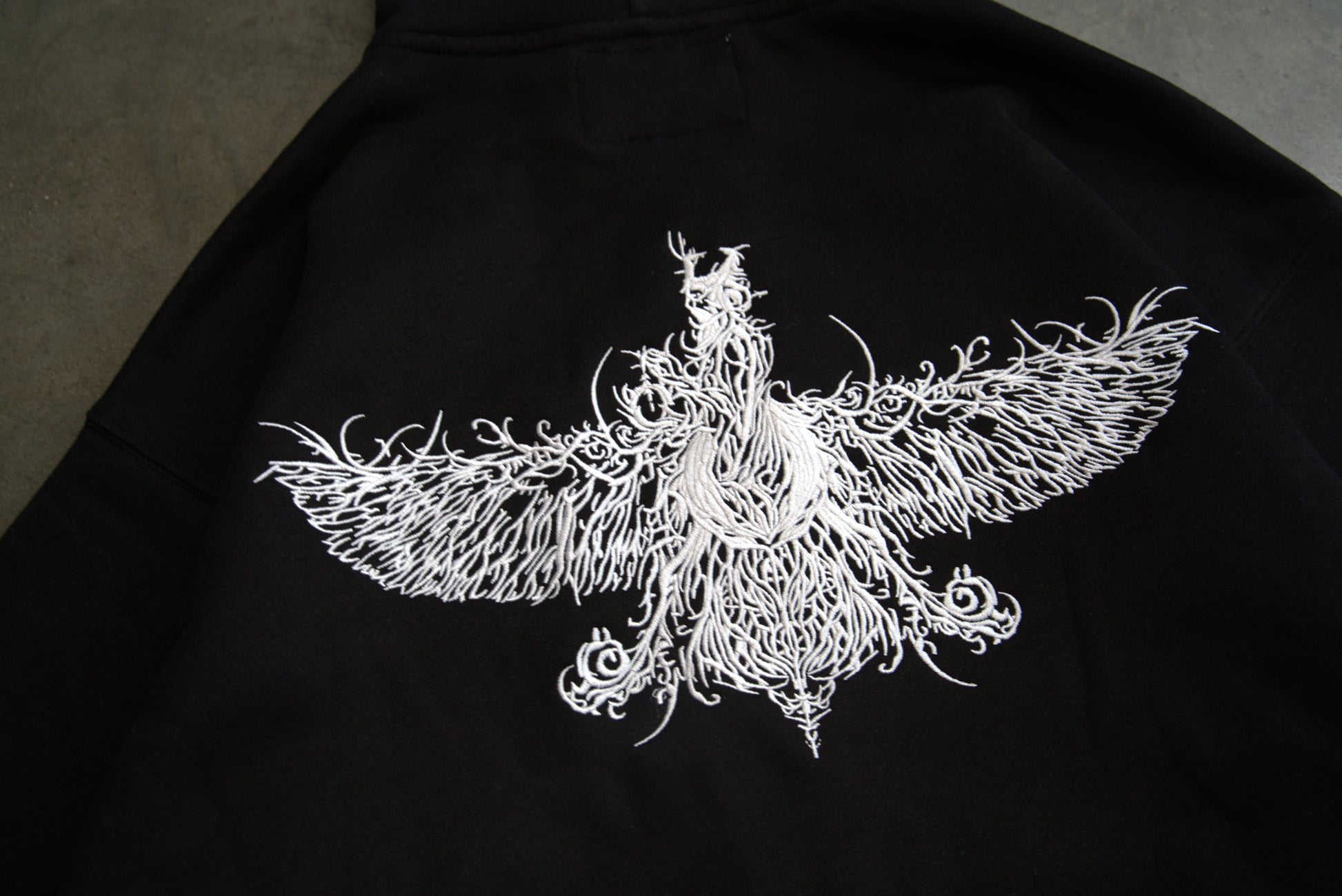 Custom farvahar stiching detail on Persian streetwear hoodie