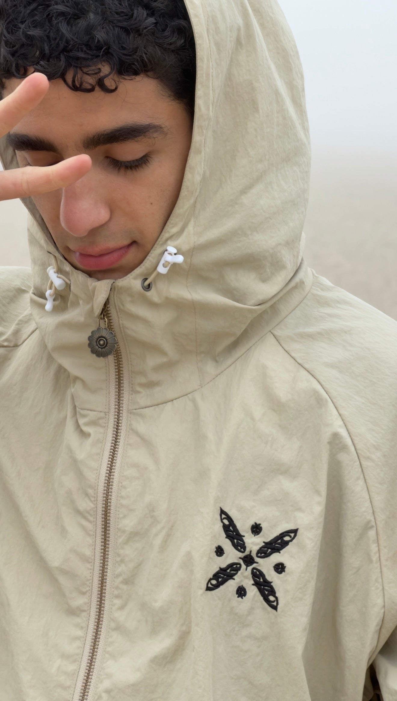 Sassanid windbreaker Kaviani design embroidered chest Xodafez jacket close up